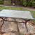 64 x 38 Glass top patio table 2 thumbnail
