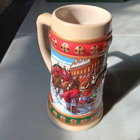7 different Budweiser holiday steins. 1