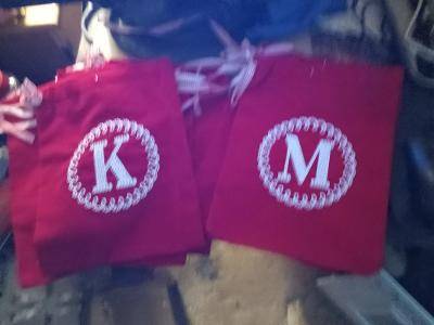 8 cloth bags with K and M on them 1