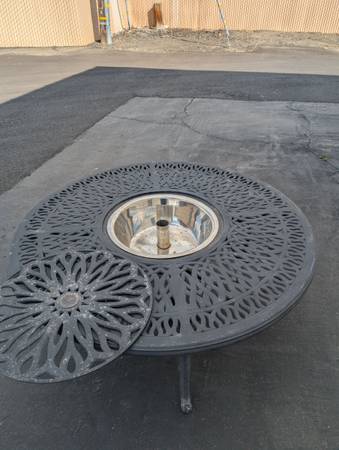 Tropitone ice bucket table 52x22h - $275 (Tracy)63471027283459121