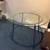 IKEA Salmi dining table with a tempered glass top and chrome-plated s 2 thumbnail