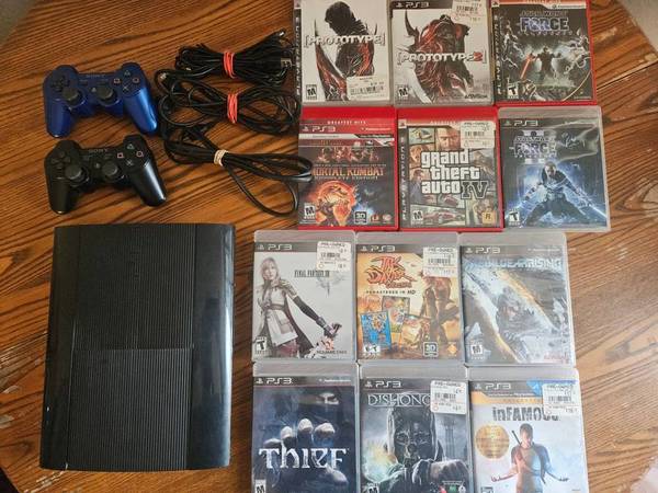 PS3 Super Slim w/games + 2 controllers 1