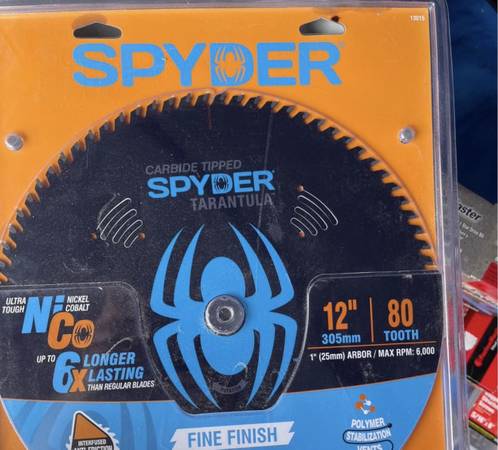 Three 10” saw blades and two 12” saw blades 1
