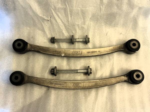 E9X M3 / E82 1M OEM rear toe arms with adjustment bolts 1