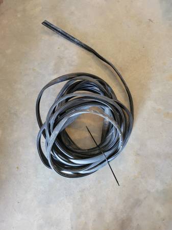 Rubrail insert, 1-1/4", black, 50 ft 1