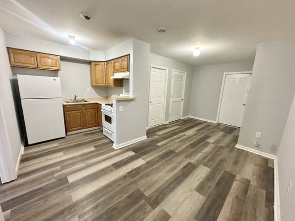 ALL UTILITIES INCLUDED! Cozy two-bedroom apartment located on the lowe 1