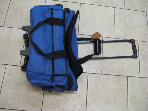 FOLDING BLUE CANVAS TRAVEL BAG WITH WHEELS 1