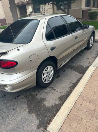 2000 pontiac Sunfire 4 door at runs n drives current emissions n tags 1