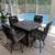 Bar height table with rock fire pit w/4 chairs - $500 OBO (Lincoln 1 thumbnail