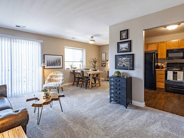 Built-In Microwave, Tiled Shower Surround, Hardwood-Style Flooring 1