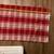 Red plaid throw rug, ~2’ x 3 ‘ 1 thumbnail