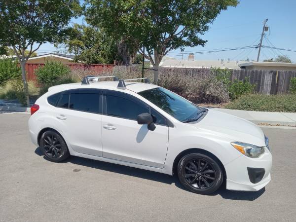 2012 Subaru Impreza AWD automático ¡Acaba de pasar la prueba de emisiones! 4 cilindros! ¡Funciona bien, mira! - $4,250 (hayward / castro valley)63623991800579122