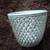 RARE, CERAMIC BASKET WITH OPEN WEAVE. 7in.tall x 9in.wide 1 thumbnail