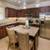 European-Style Cabinetry, Granite Kitchen Countertops, Refrigerator 1 thumbnail