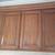 WALNUT STAINED UPPER CABINETS W/DOORS and SHELVES 1 thumbnail