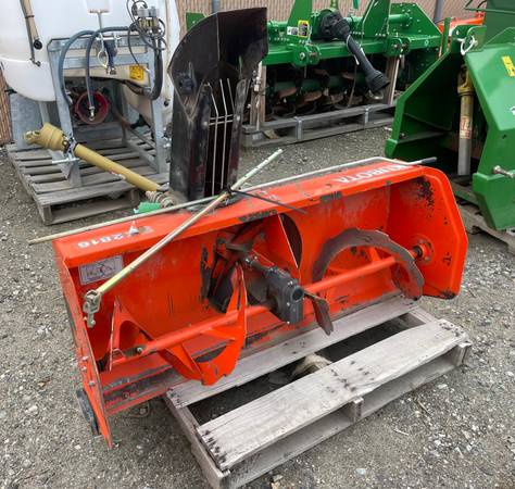 Kubota BX2816 front mount snowblower. 1