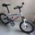 KIDS INFINITY COASTER BRAKE-FRONT SHOCK BIKE. 4 thumbnail