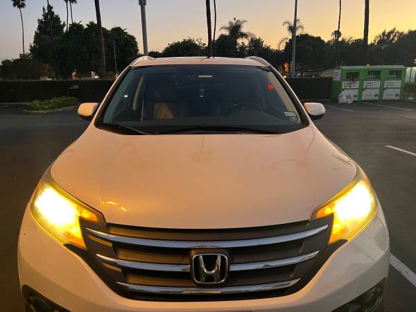 2014 Honda CRV EX-L, título limpio - $7.90063470061068803123
