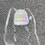 mini white iridescent backpack from Bath and Body works, new 1 thumbnail