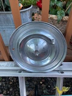 1957 Oldsmobile hub cap 1