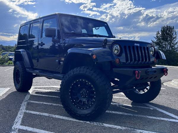 2013 Jeep Wrangler Unlimited Sahara 4X4 Black 4dr New 35" Tires Lifted - $14,999 (Englewood)63620062305411120
