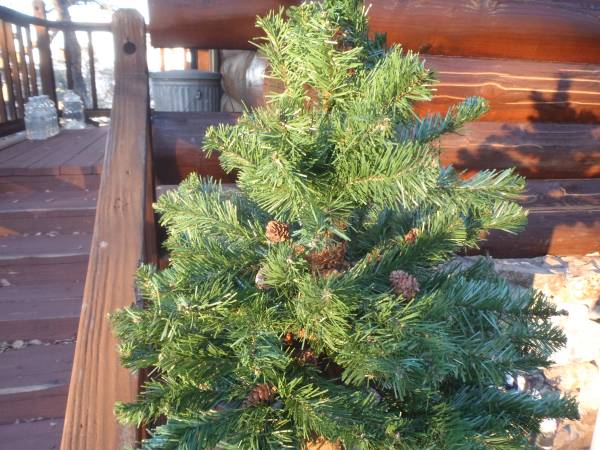 large fake Christmas tree with little pine cones all in great shape 1