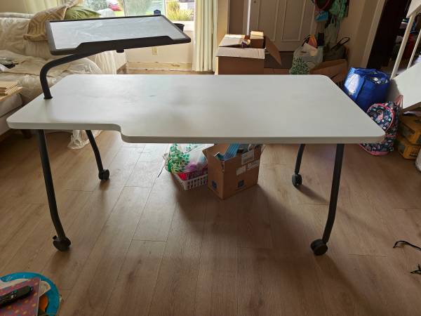 Desk with locking wheels and adjustable computer stand 1