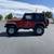 Adventure-Ready 1997 Jeep Wrangler Sport in Vibrant Red 9 thumbnail