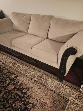 Beige Couch With Dark Accents 1