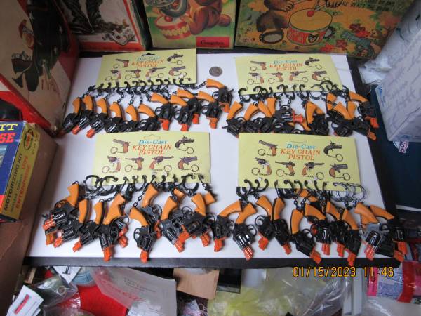 Diecast Key Chain Pistol Display Card of 12, 4 Cards New Old Stock 1