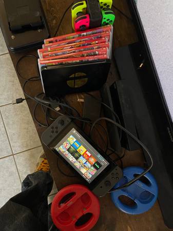 Nintendo switch + games + accessories 1