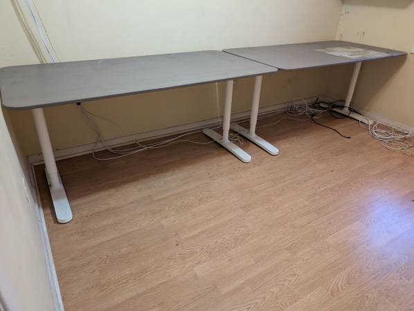 2 IKEA adjustable height tables 1