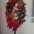 Lighted Christmas wreath on a metal stand 1 thumbnail