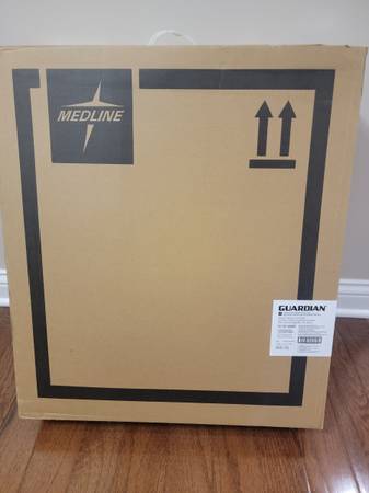 Folding bedside commode chair (new) 1