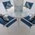 White Metal Patio Set 1 round glass top tab & 4 chairs with cushions 1 thumbnail