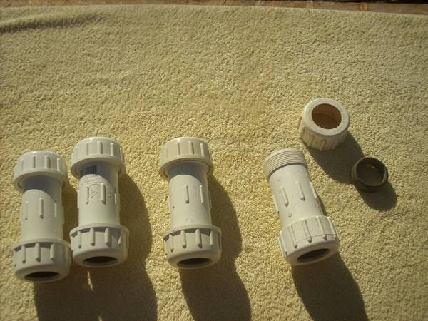 4 PVC 1-1/4" inch compression couplers 1
