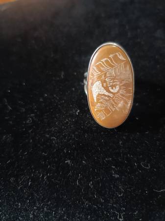 Sterling silver ring with carved eagle on stone. 1