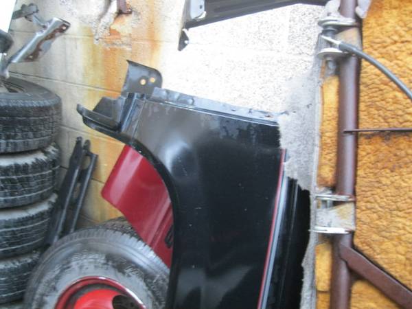 00 Tahoe limited left fender black 1