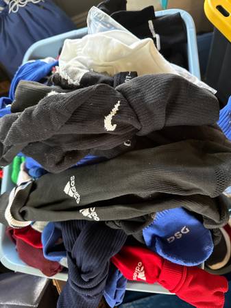 Huge bin of soccer/football/ sport socks 1