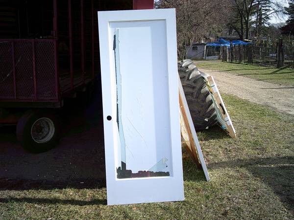 New 24" x 80" white full lite door slab 1