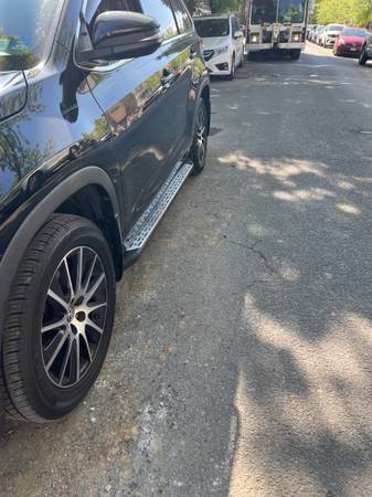 2018 Toyota Highlander SE, asiento capitán - $19,900 (Brooklyn)63618009827971122