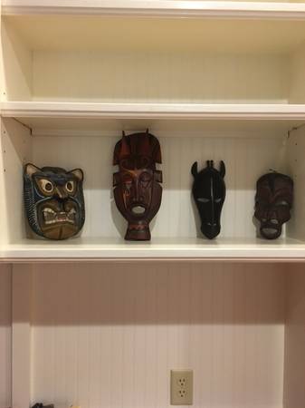 Antique hand-carved wooden masks 1