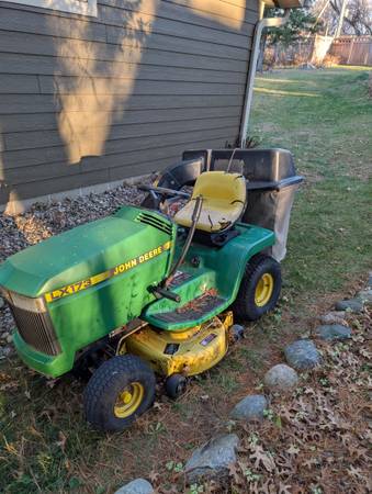 John Deere riding mower with bagger 1