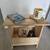 Stylish light brown stool with storage 1 thumbnail
