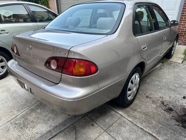 2001 toyota corolla - $4,30063615173274627124