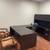 executive-style private office  dark wood-grain L-shaped desk with integrated ca 3 thumbnail