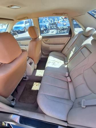 2003 TOYOTA AVALON XL GOLD - $3,800 (Aurora)63619618155779124
