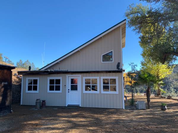 85 acres with 1200sq ft off grid home with incredible View 1