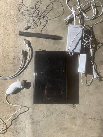 Wii console with x2 skylander video games 1