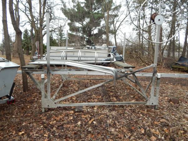 Aluminum boat lift with 100" x 20' awning/ worn cover 1